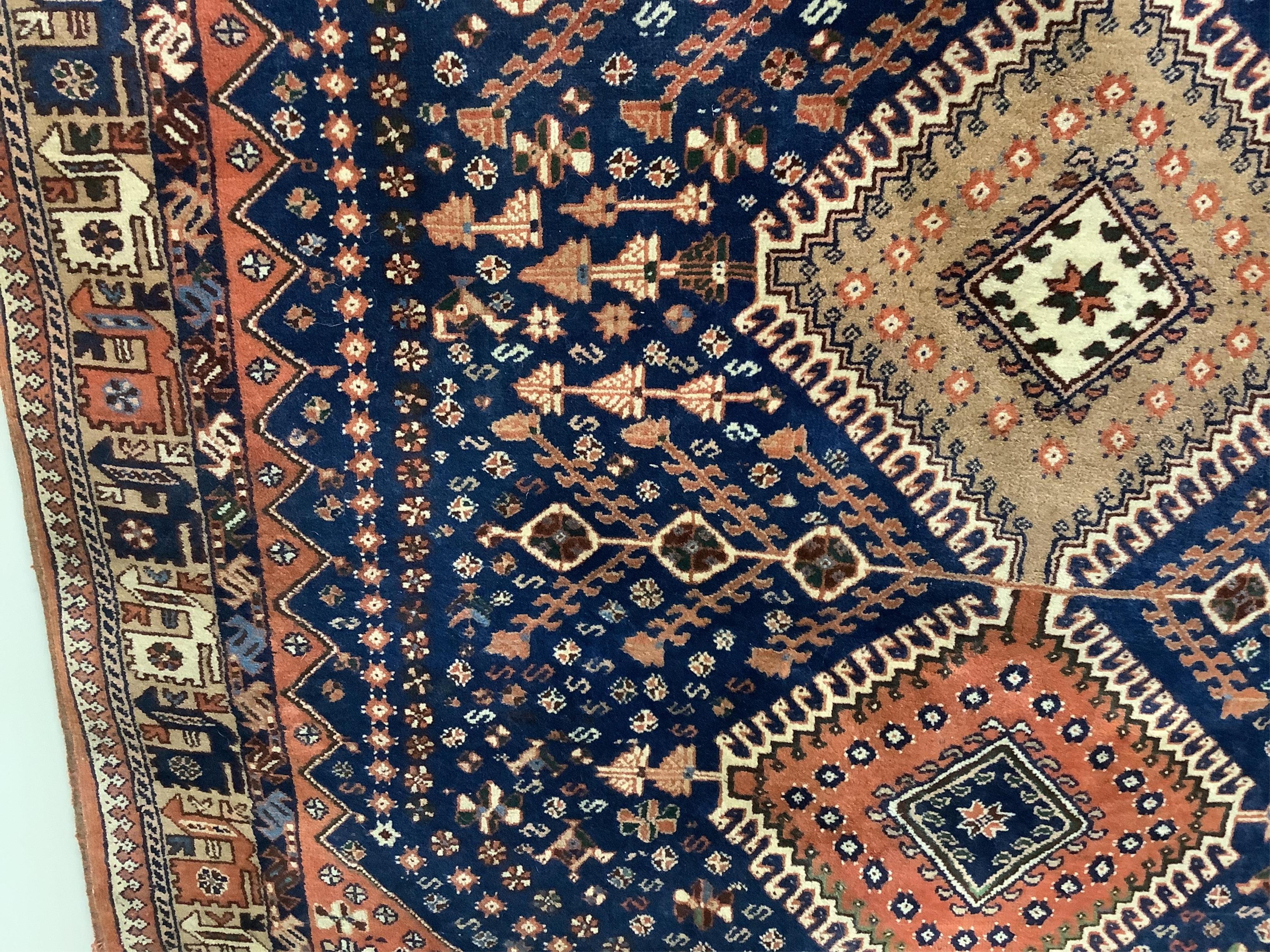 A North West Persian Yalameh blue ground rug, 226 x 151cm. Condition - fair